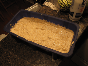 Transferring to loaf pan Transferring to loaf pan